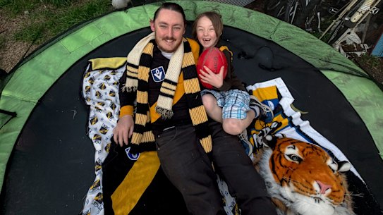 Tiger supporters John Carr and his son, Richmond, 6, who is named after the club.