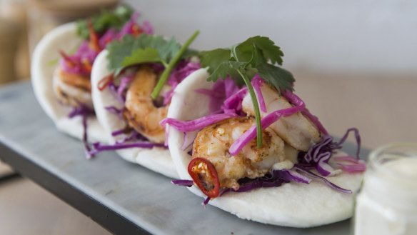 Prawn bao with punchy ginger-garlic prawns and jalapeno mayo.