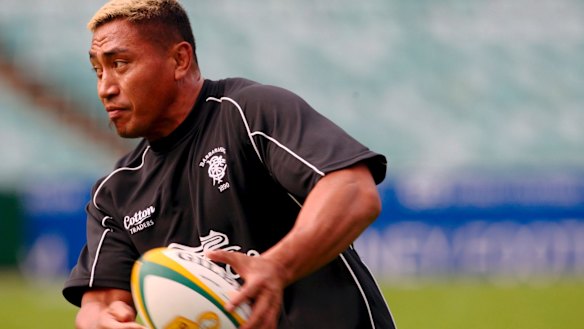 All Blacks pay their respects to Jerry Collins with the Webb Ellis Cup