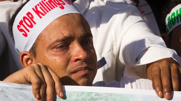 A Rohingya man living in Malaysia cries during a December 4 protest in Kuala Lumpur against the persecution of Rohingyas in Myanmar.