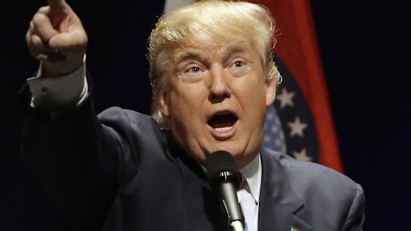 Cancelled rally: Republican presidential candidate Donald Trump in St. Louis on Friday before moving on to Chicago.