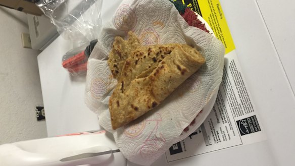 A half-open packet of flat bread.