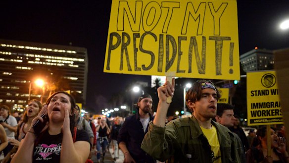 Protesters march through downtown Los Angeles during a protest against President-elect, Donald Trump.