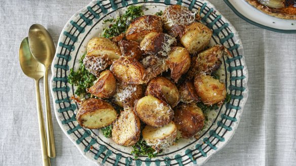 Cacio e pepper roast potatoes on a bed of coriander and olive salsa.