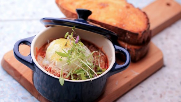 Meatballs with slow-cooked egg and pecorino dusted toast.