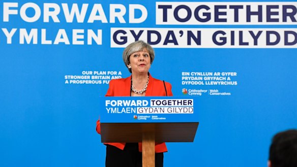 Theresa May has been forced to backtrack on one of her most striking election pledges.