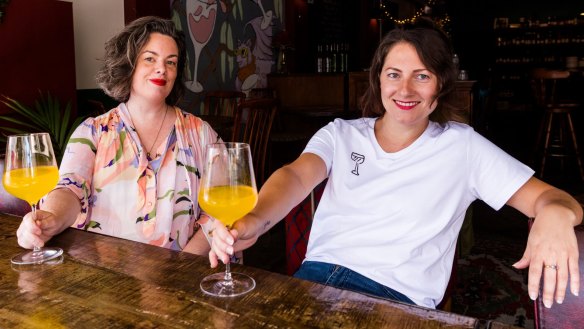 Jacqueline Turner (left), sommelier at Margaret restaurant, and Bridget Raffal, manager at Where's Nick bar, with a couple of Triple Fizzes,  Bridget's go-to remedy after a big night.