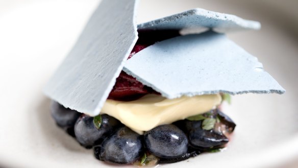 Automata in Sydney is darkly glamorous with dishes such as lemon posset, blueberry, lemon thyme and black sesame.