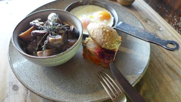 Bubble and squeak with baked eggs and mushroom ragu.