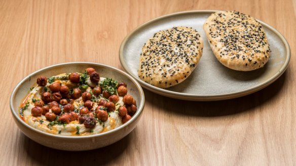 Fava bean hummus with crisp chickpeas and flatbreads.