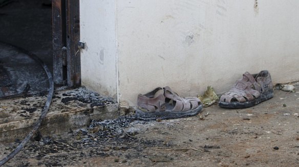 A pair of slippers outside the Dawabshe family home in the Israeli-occupied West Bank.