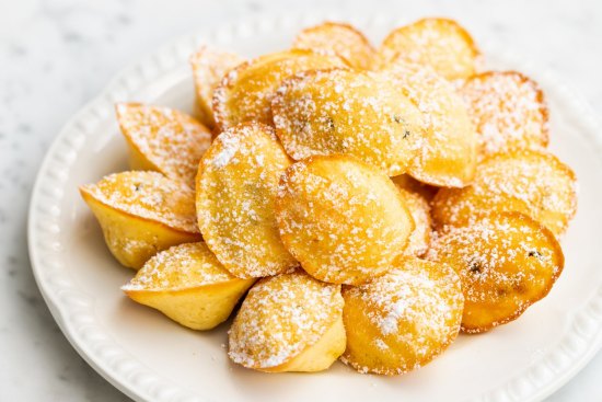 Mini passionfruit madeleines.