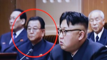 Kim Yong Jin, second from left, a vice premier on education affairs in North Korea's cabinet, and North Korean leader Kim Jong-un, second from right.