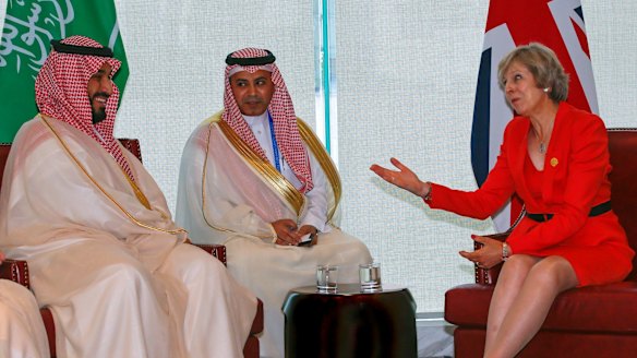 Britain's Prime Minister Theresa May and Saudi Arabia's Deputy Crown Prince Mohammed bin Salman, left, hold a bilateral meeting before the start of the G20 summit in Hangzhou, China.