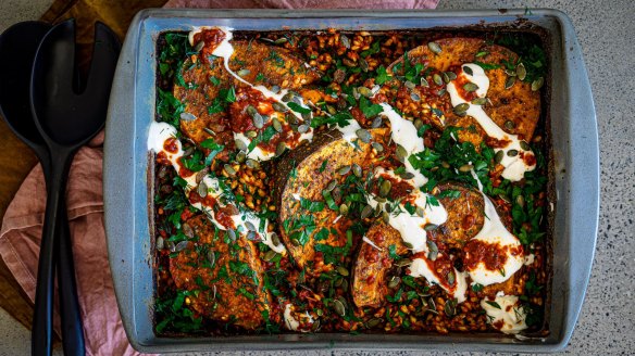 One-dish wonder: Spiced pumpkin wedges with tomato and pearl barley.
