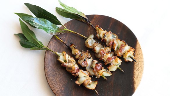 Barbecued abalone skewers at Mimi's in Sydney.