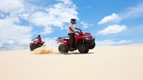 Riding the dunes.