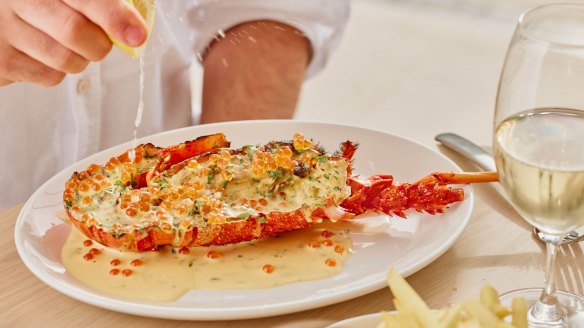 Half lobster with lemon, parsley and salmon roe sauce.
