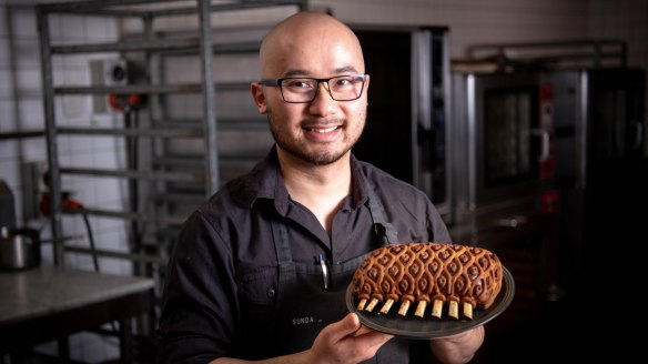 Khanh Nguyen with a shortcrust pastry-wrapped rack of lamb.