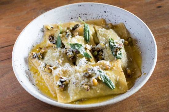 Pumpkin ravioloni with pistachios.