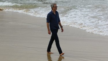 Author Michael Sala has a new book in print, The Restorer, which is set in Newcastle East. Picture shows Michael Scala at Newcastle Beach.