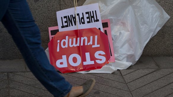 A 'Stop Trump' banner after an environmental protest outside the US embassy in Madrid on Friday.