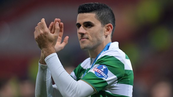 Tom Rogic scored an extra time winner to spur Celtic to Scotland's third domestic glory of the season.