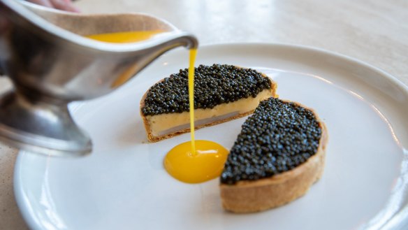 Caviar and scallop mousseline pie with citrus butter.