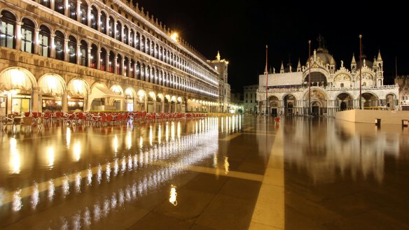 Restaurant Quadri spills out onto St Mark's Square, Venice.