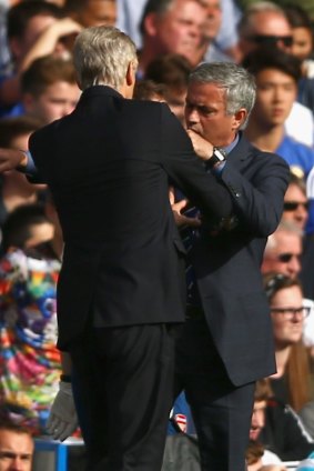 Famous incident: Arsene Wenger and Jose Mourinho clash in 2014.