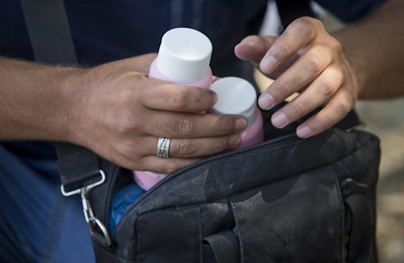 Mekdad Marey, 25, a computer graphics designer from of Damascus, Syria, shows items in his bag, after crossing from Serbia to Roszke, Hungary. 