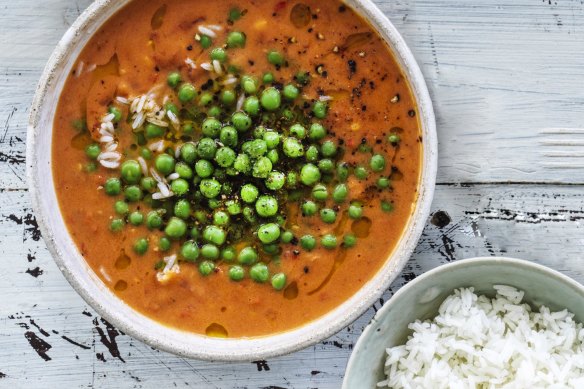 A humble bag of frozen peas adds freshness to this pantry braise.