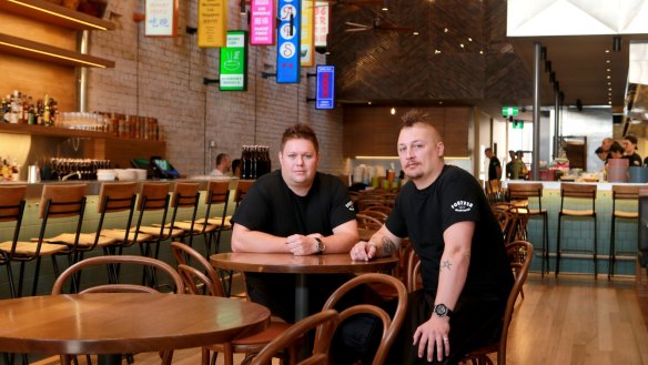 Chefs Damian Snell and Benjamin Cooper inside Hawker Hall.