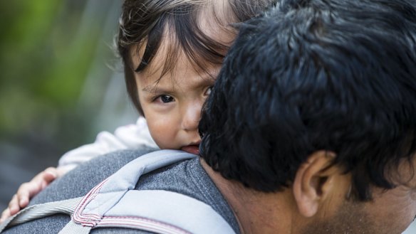 Migrants from Syria rest after crossing illegally the border between Serbia and Hungary, near Szeged, Hungary on Wednesday. 
