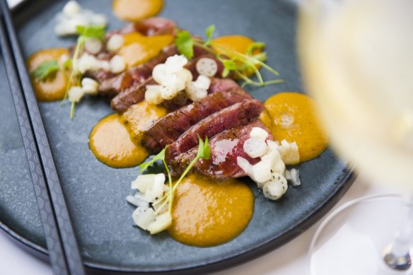 Vindaloo steak tataki, soy smoked egg yolk, pickled baby lotus root. 