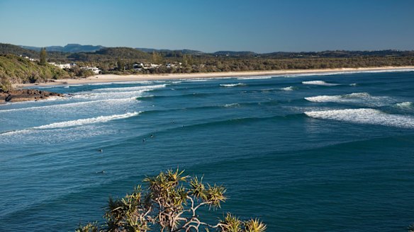 Surfers catching a morning wave at Cabarita Beach, Northern Rivers.
