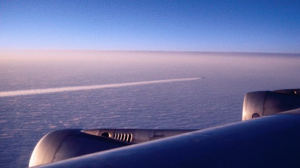 The variety of contrails seen in the sky is due to atmospheric conditions and altitude.