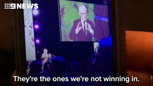 Malcolm Turnbull mimics the US President at the Midwinter Ball in Canberra.
