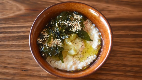 Stracciatella with fried curry leaves.