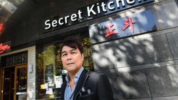 Clifford Qwah outside his flagship Chinatown restaurant Secret Kitchen.