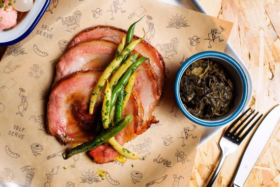 Go-to dish: Porchetta with charred scallions.