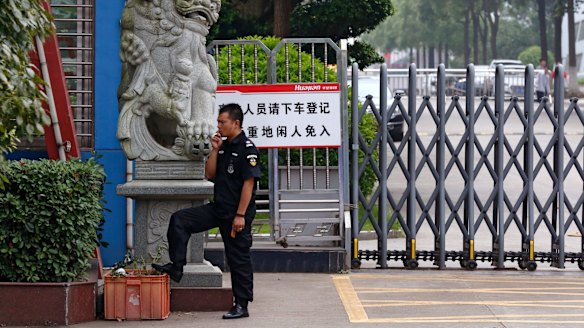 A security guard at the Ganzhou Huajian International Shoe City Co, which has been used by Ivanka Trump's brand.