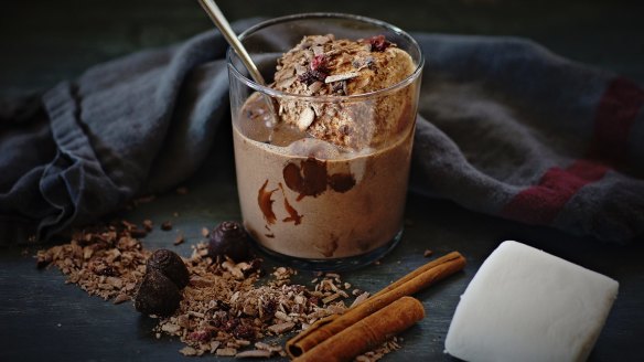 A jumbo marshmallow bobbing in spiced hot chocolate.