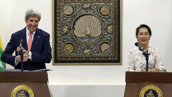 Myanmar Foreign Minister Aung San Suu Kyi, right, with US Secretary of State John Kerry in May.