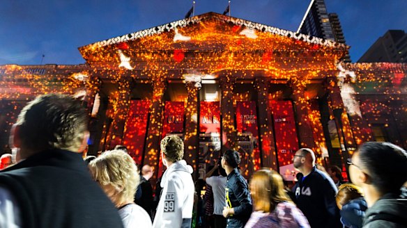 Melbournians gaze up at The Night Garden projected onto the State Library during the fifth annual White Night.