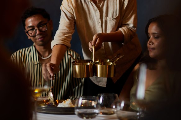 Bengali bohg (feast) is ladled out by waiters, thali restaurant-style.