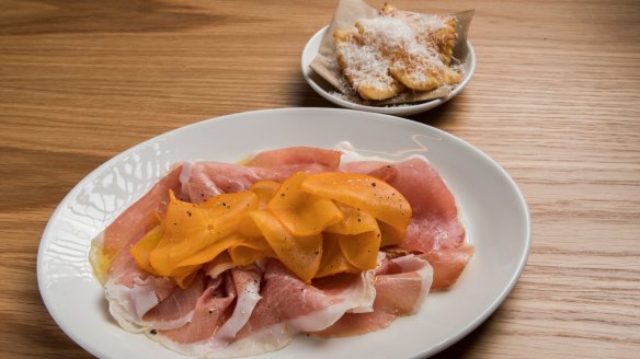 Culatello, salted persimmon and gnocco fritto.