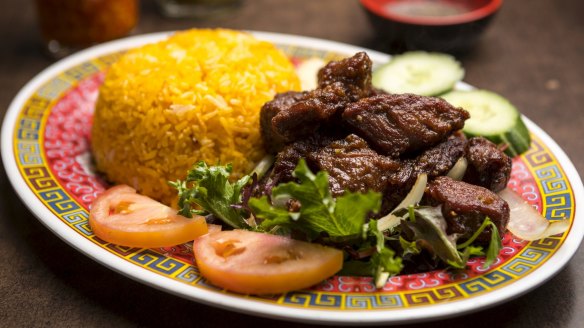 Tender beef cubes with red rice.