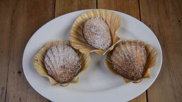 Madeleines are baked to order in scallop shells. 
