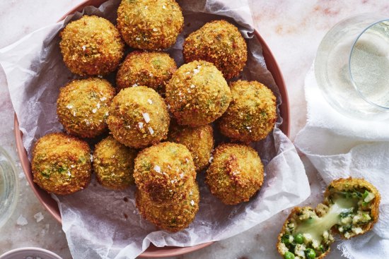 Spring arancini with  molten cheese centres.